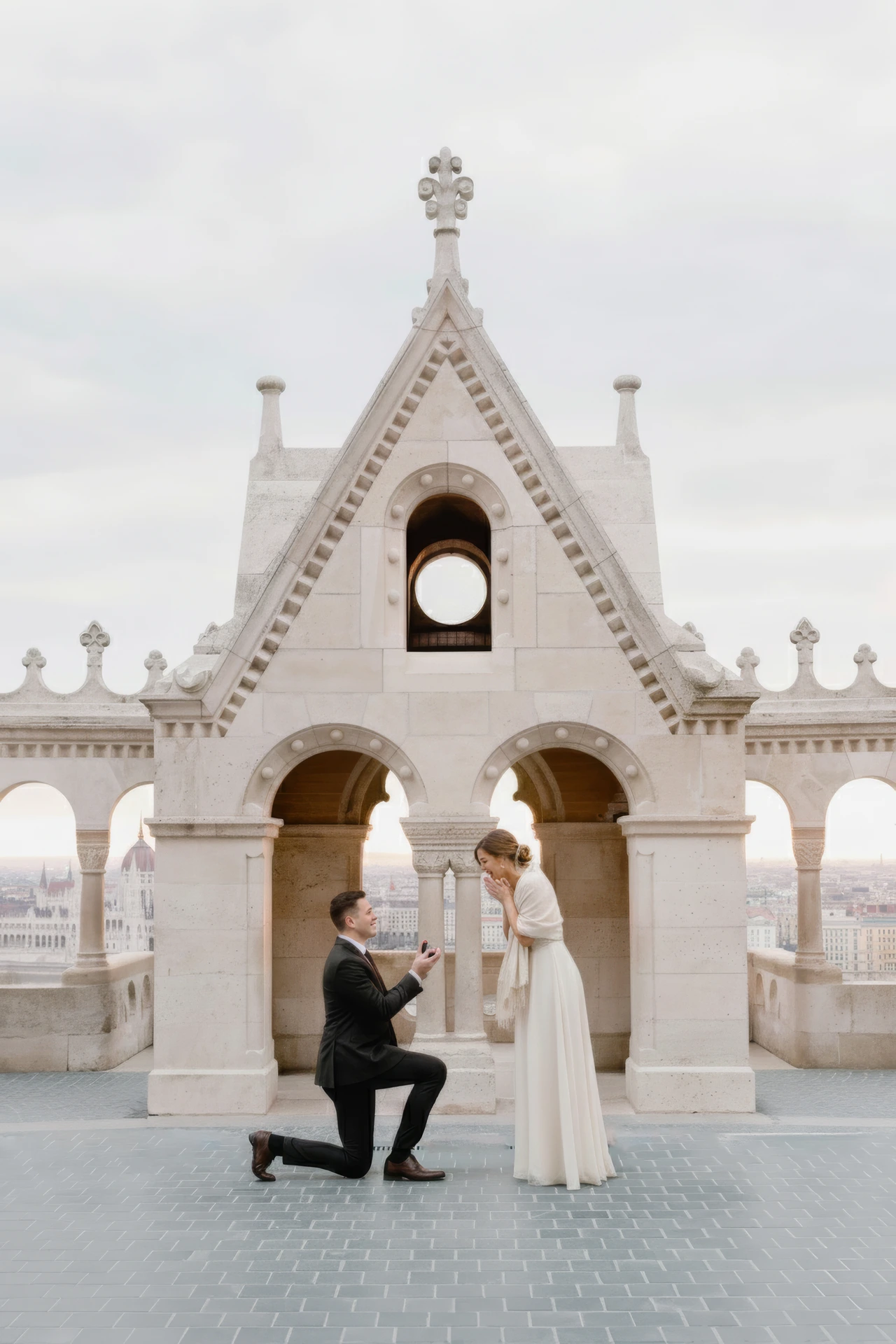 6 Winter Proposal Locations Around the World proposal moment Couple during a proposal moment, for the 6 Winter Proposal Locations Around the World guide.