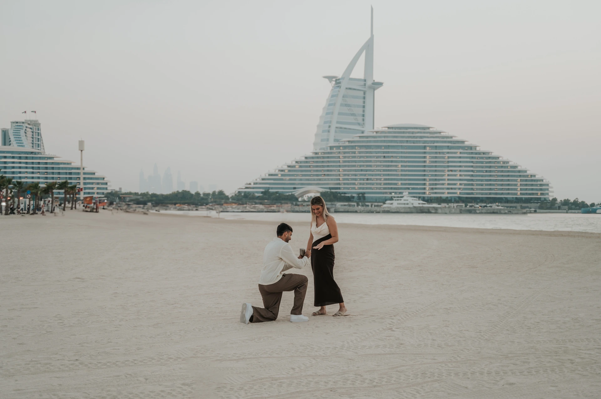 Beach proposal moment near Burj Al Arab before Shimmers dinner