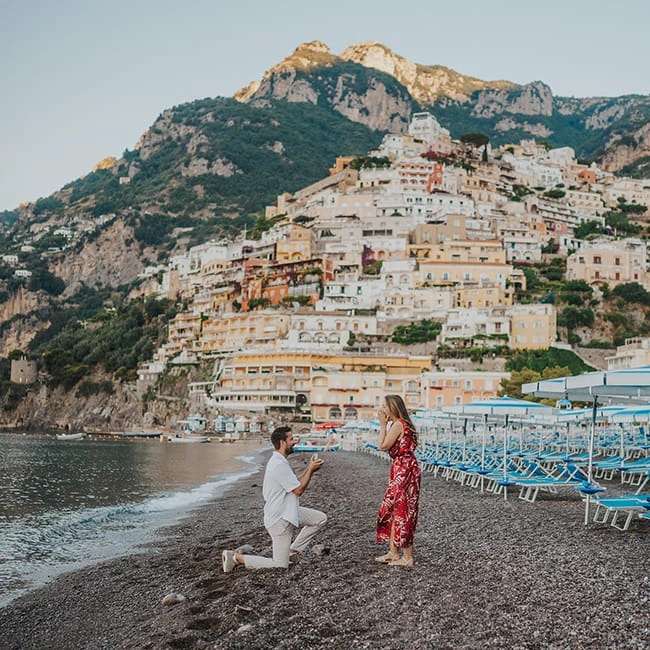 Surprise proposal on Positano beach during an Amalfi Coast photoshoot