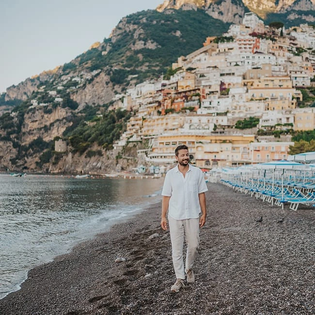Solo traveller portrait on Positano beach during an Amalfi Coast photoshoot