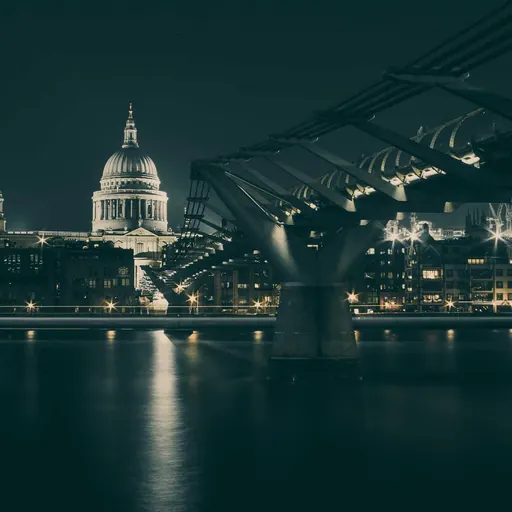 London St Pauls Cathedral Night Photography St Paul's Cathedral and Millennium Bridge illuminated at night across River Thames in London