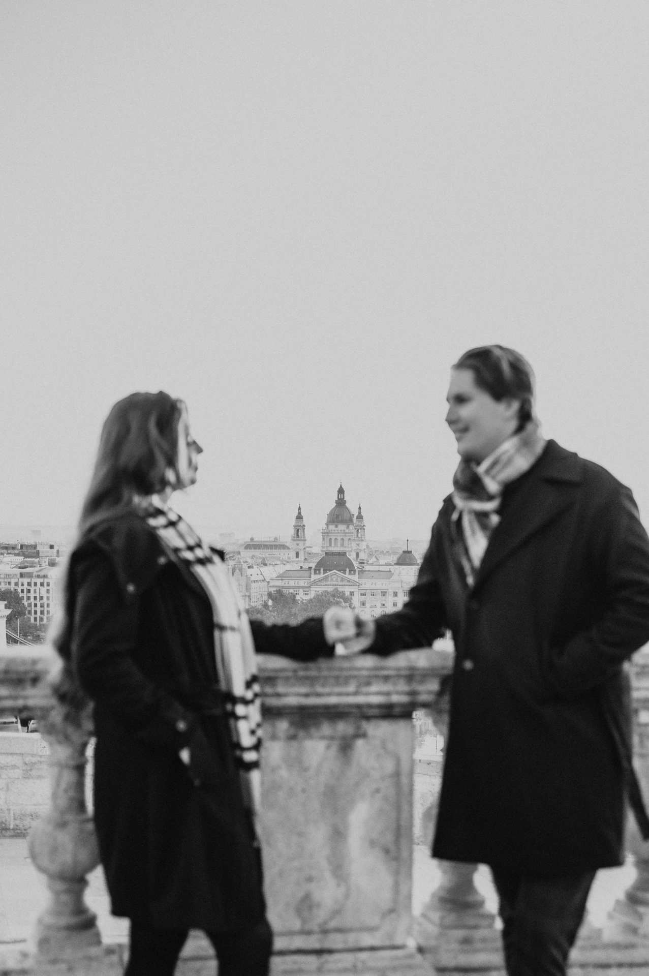 Black and white close portrait of a couple looking at each other during their Budapest photoshoot at Buda Castle