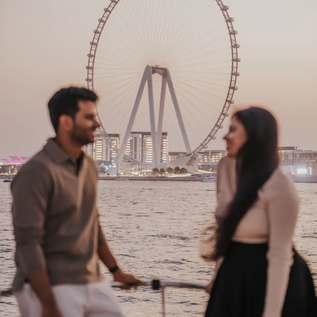 Dubai couple photoshoot Couple photoshoot in Dubai on a boat with the Ain in the background
