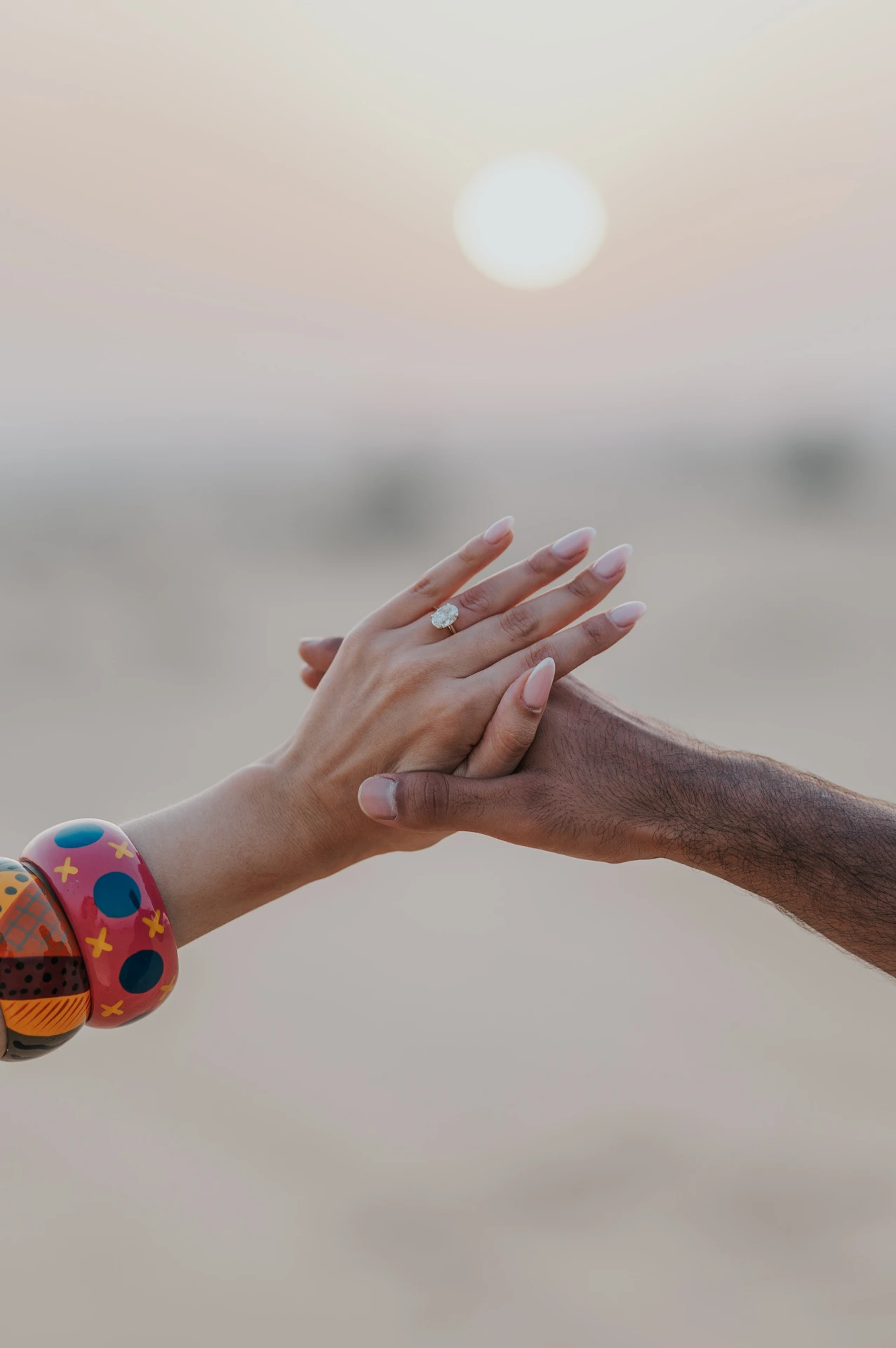 Desert proposal in Dubai with couple overlooking the desert