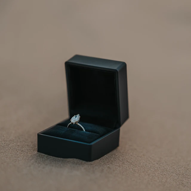 Dubai desert proposal Ringbox in the desert sand during a Dubai desert proposal