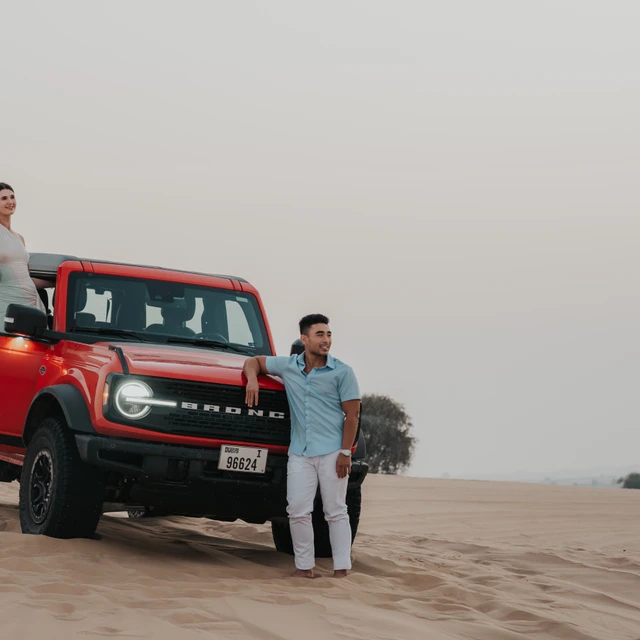 Desert proposal Dubai Desert proposal in Dubai with couple overlooking the desert