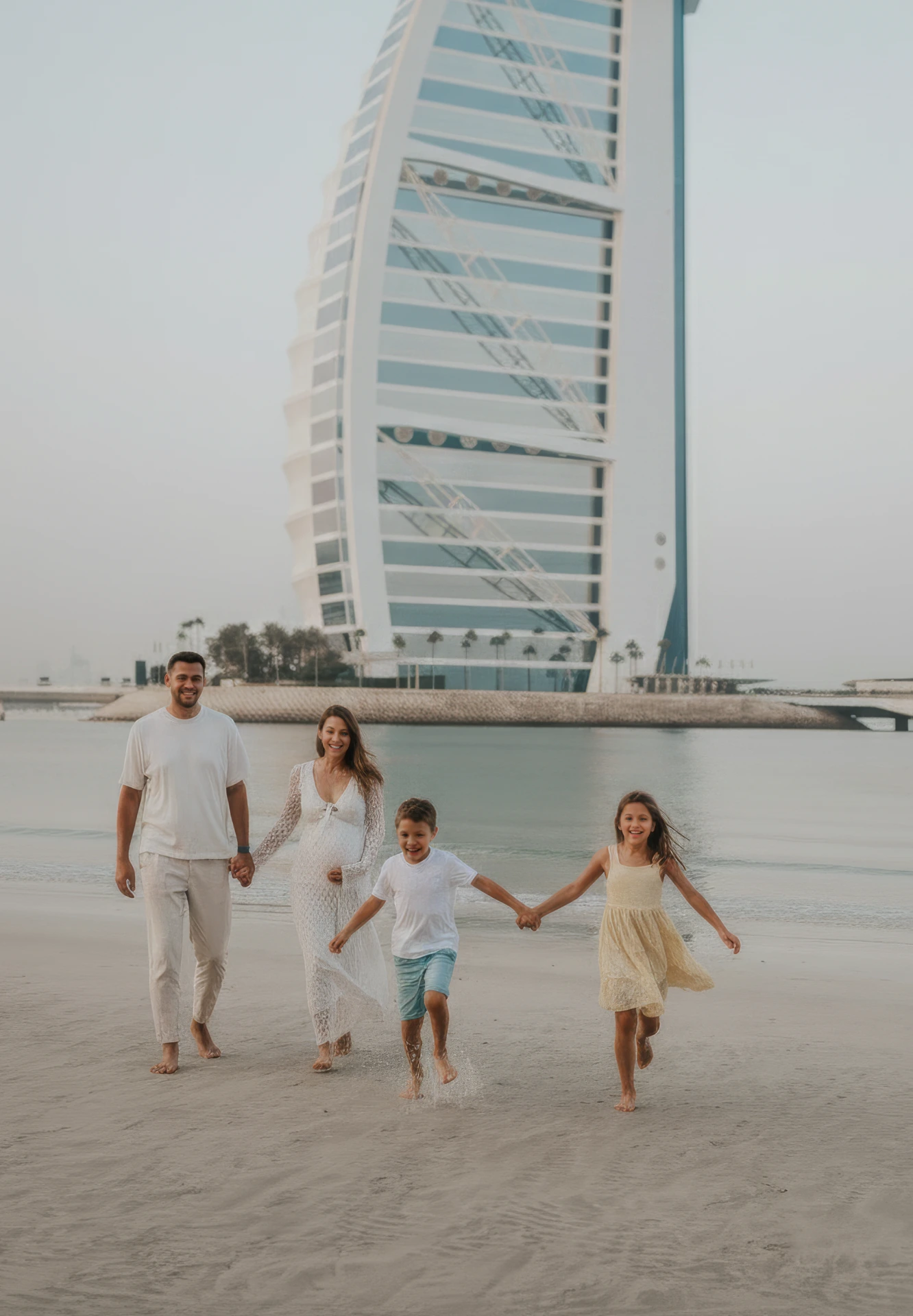 Dubai family photoshoot Photoshoot of a family in front of the Burj Al Arab in Dubai with the sea in the background