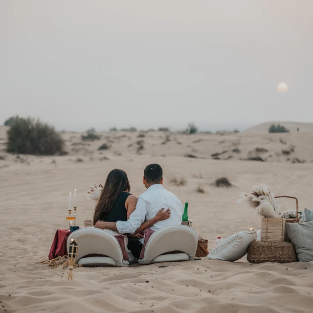 Dubai picnic proposal A couple looking over the water during their picnic proposal in Dubai
