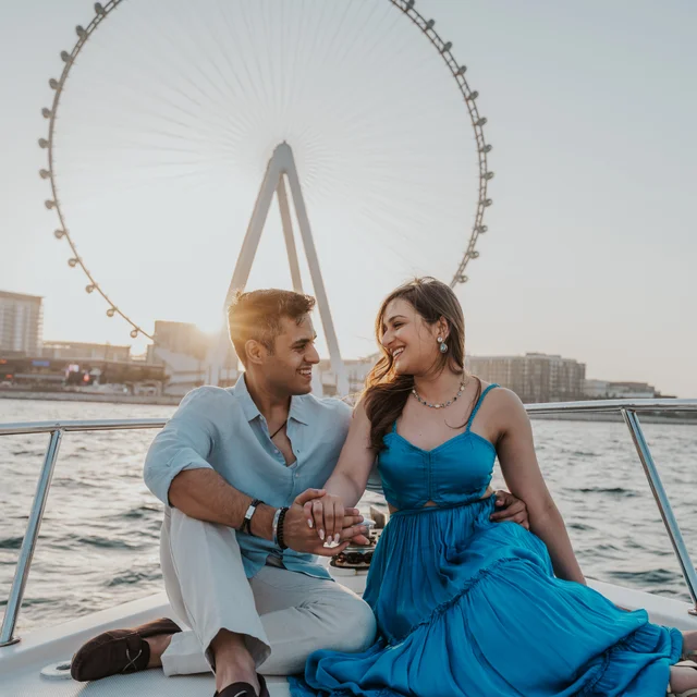 Dubai proposal photographer Couple being photographed by a professional dubai photographer with on a boat.