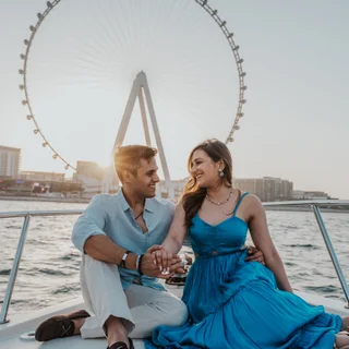 Couple being photographed by a professional dubai photographer with on a boat.