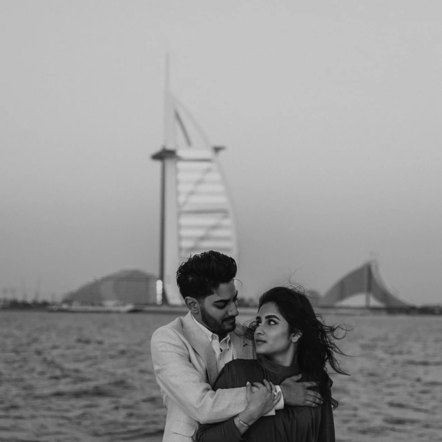 Dubai Yacht Proposal A proposal on a yacht in Dubai with Dubai Marina and Blue Waters in the background.