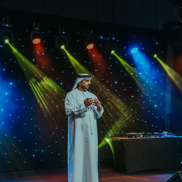 Event photographer Dubai Panel discussion at an event in Dubai being captured by an event photographer