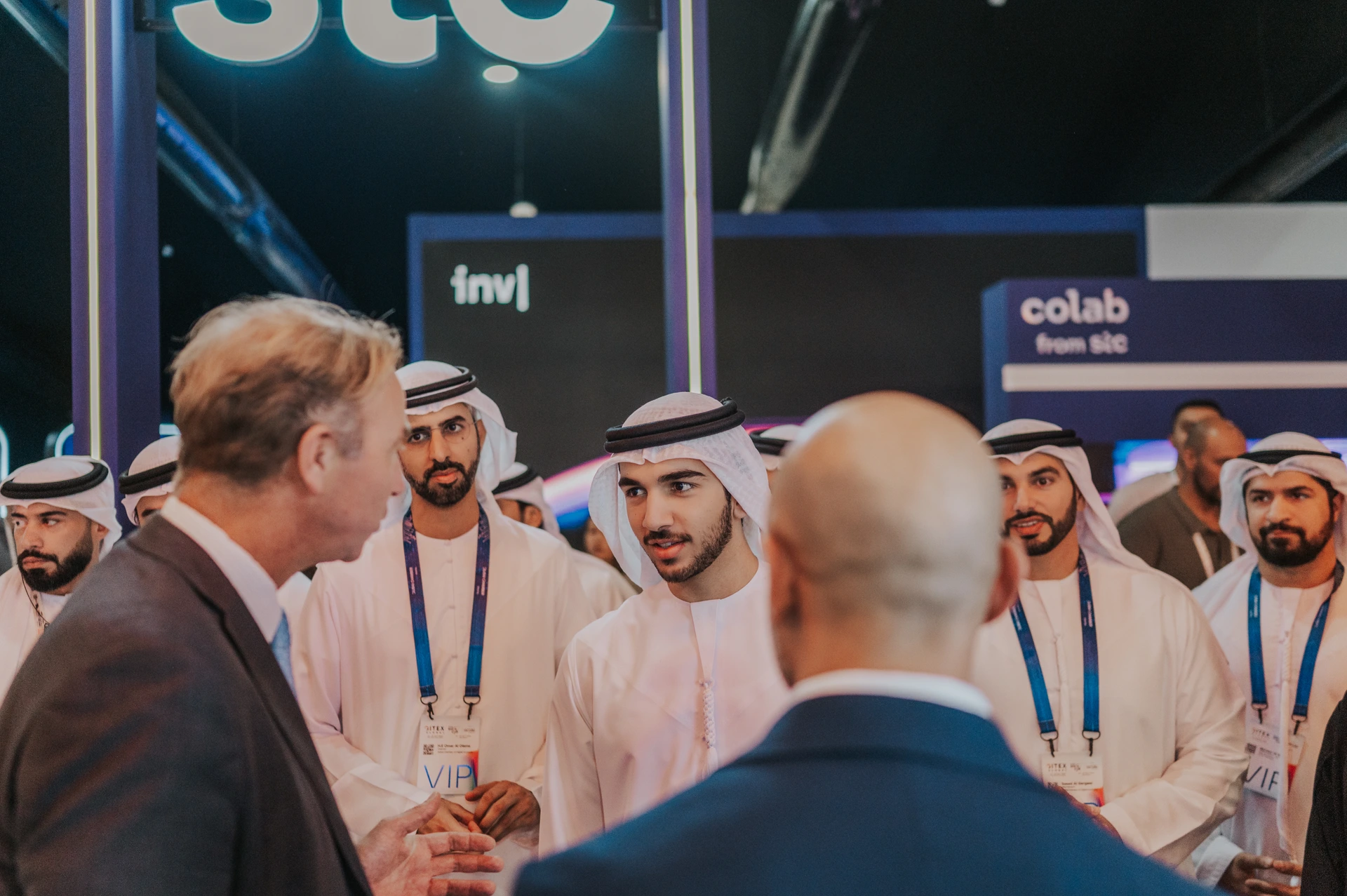 Multiple cultures being photographed at an event in Dubai by a photographer