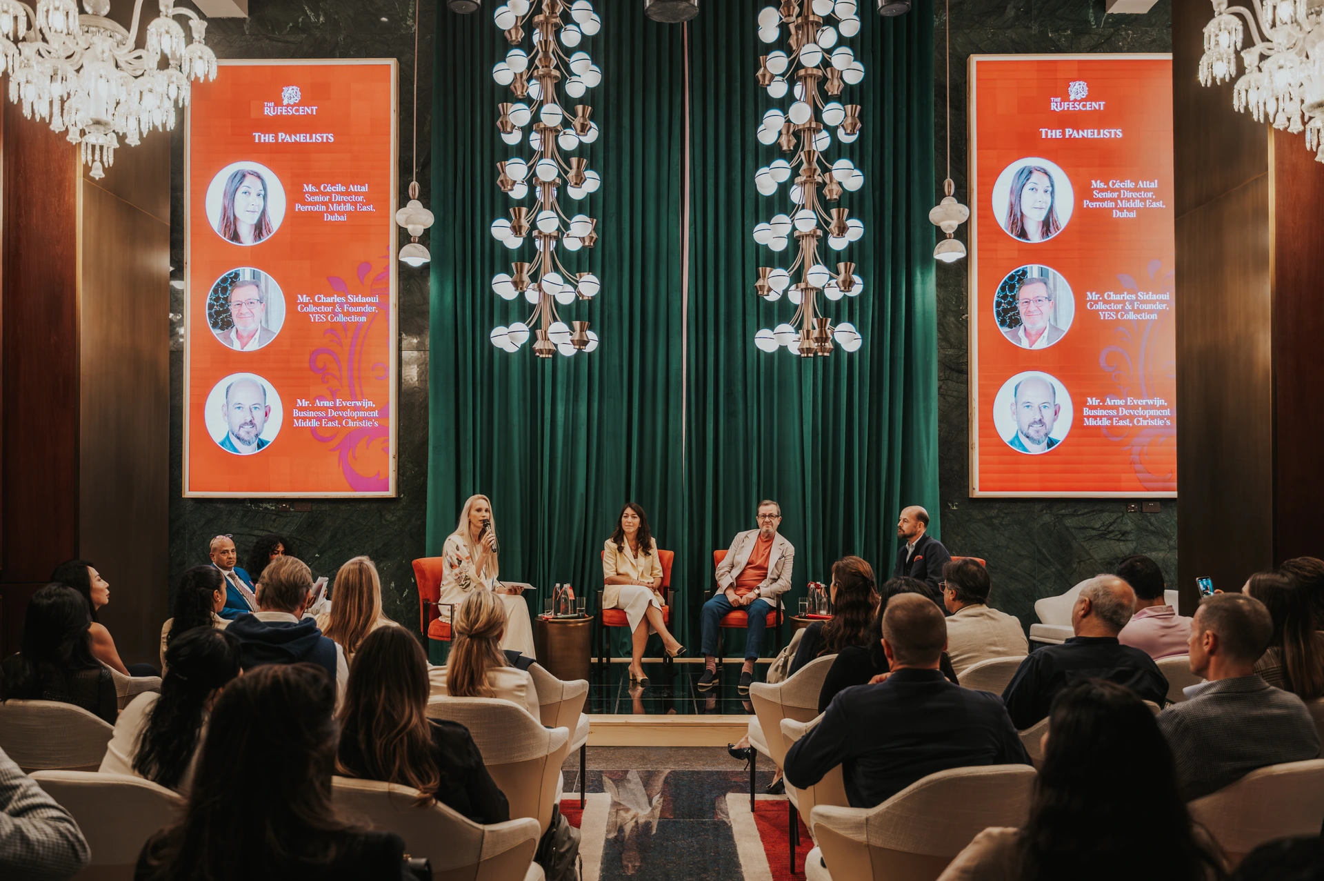 Event photographer Dubai Panel discussion at an event in Dubai being captured by an event photographer