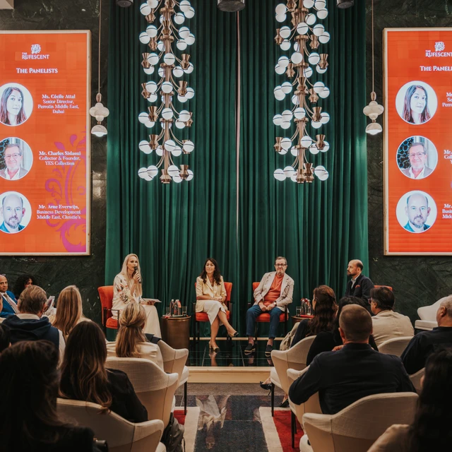 Event photographer Dubai Panel discussion at an event in Dubai being captured by an event photographer