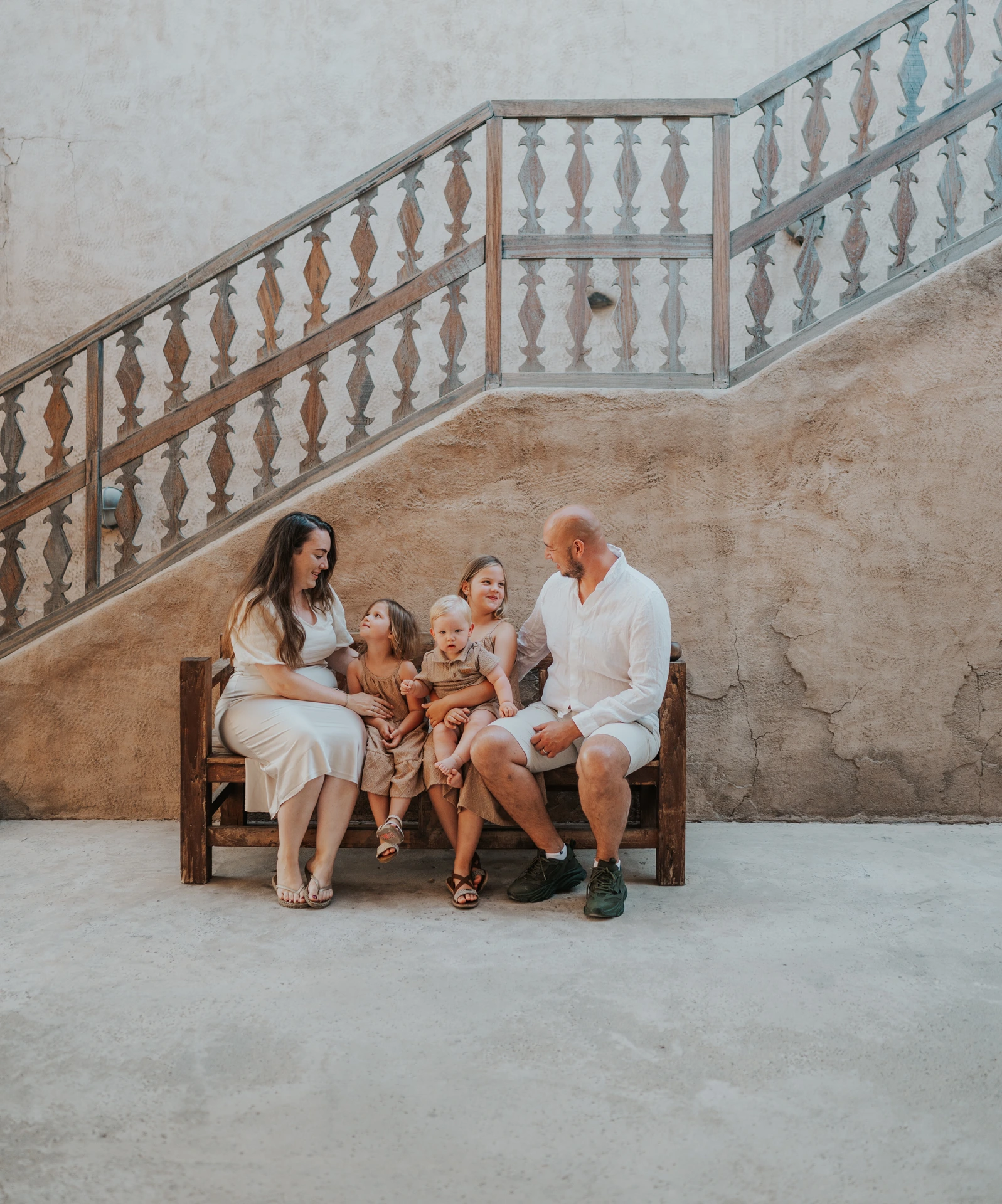 Family sitting together during a Dubai photoshoot