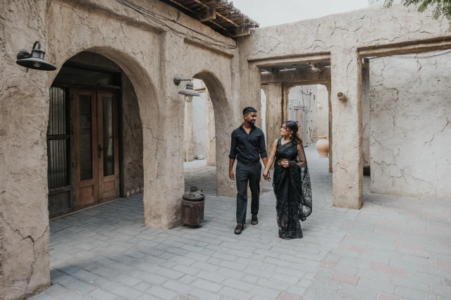 Couple in Old Dubai heritage lanes during engagement photoshoot