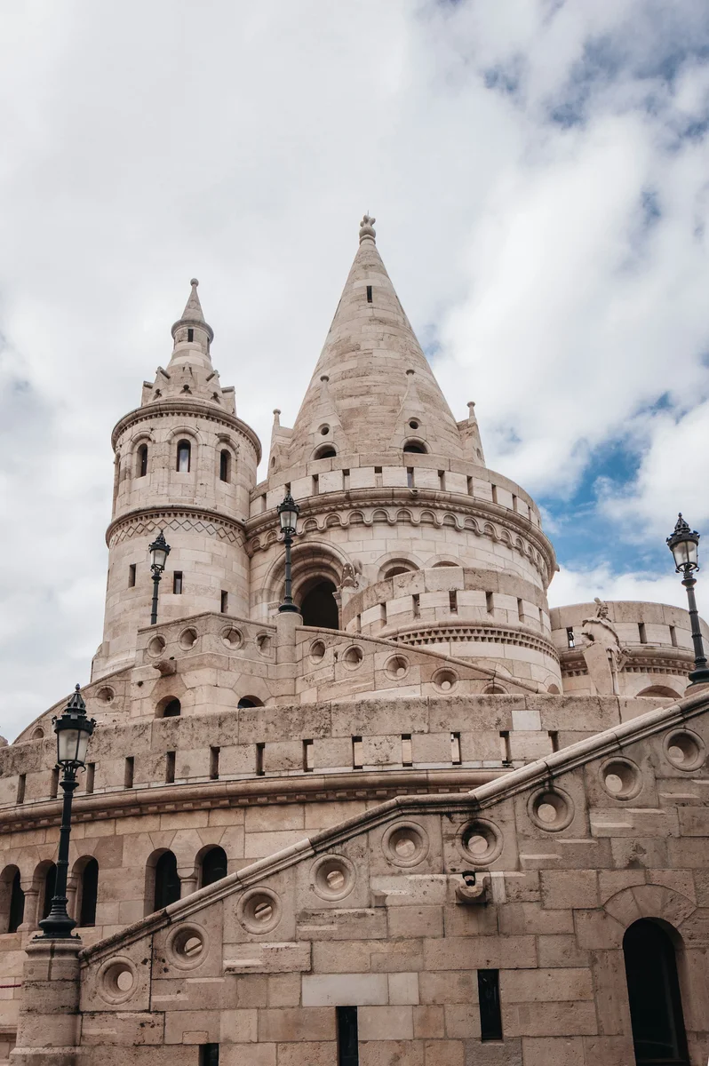 Photo of tourist trough Beautiful arch of Fisherman's Bastion in Budapest