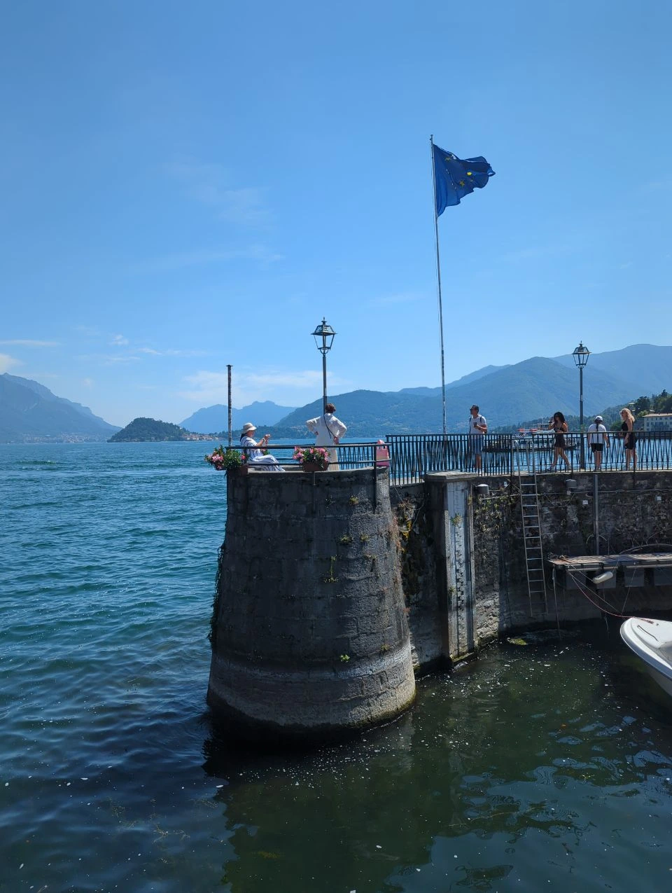 Small harbour with a stone wall in Menaggio