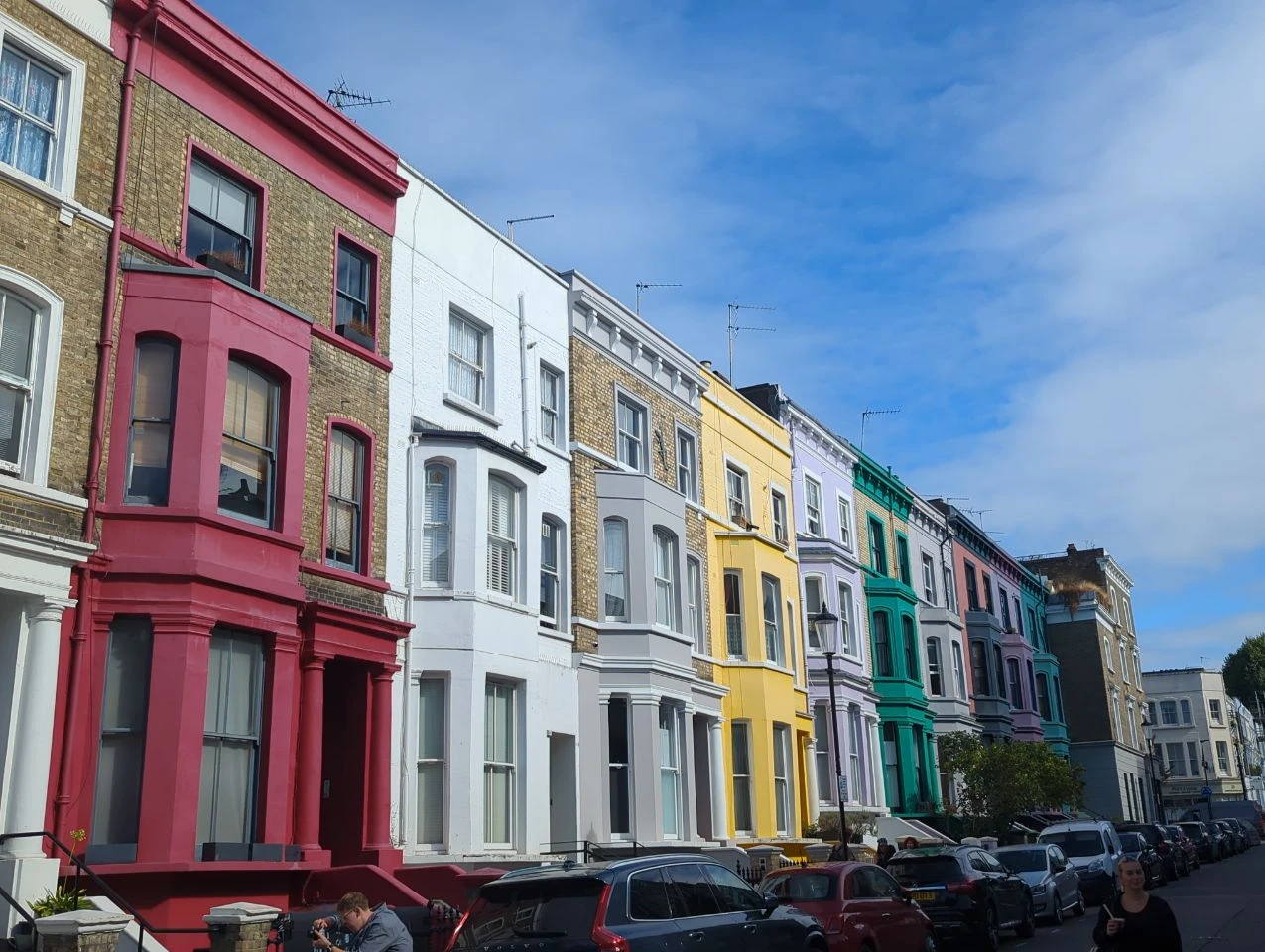 Colourful terraced houses along a residential street in Notting Hill Colourful terraced houses along a residential street in Notting Hill