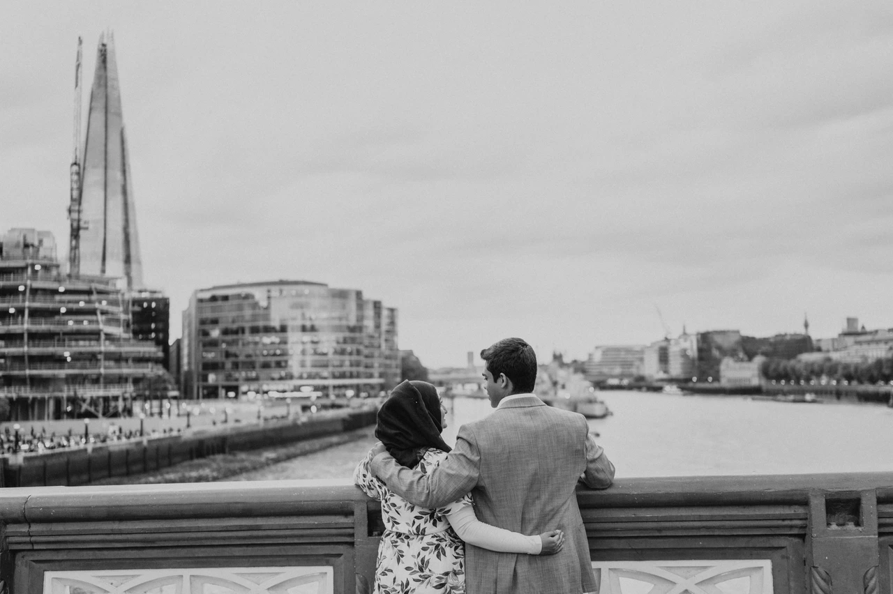 London engagement photoshoot: black-and-white view towards the Shard Black-and-white photograph of a couple looking across the Thames towards the Shard during their London engagement photoshoot.