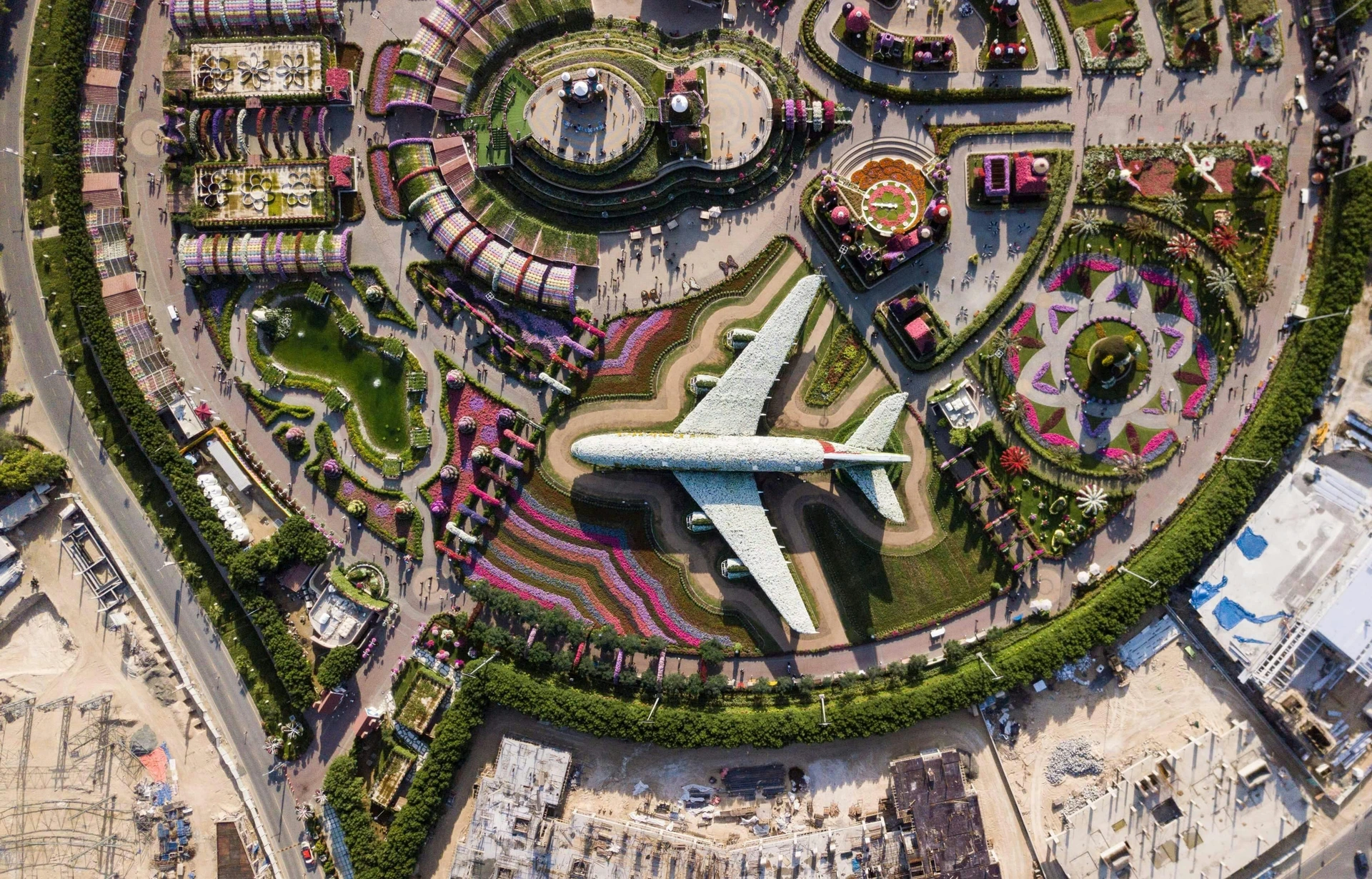 Aerial view captures Dubai Miracle Garden floral patterns and pathways, used as a location reference when planning a Miracle Garden photoshoot.