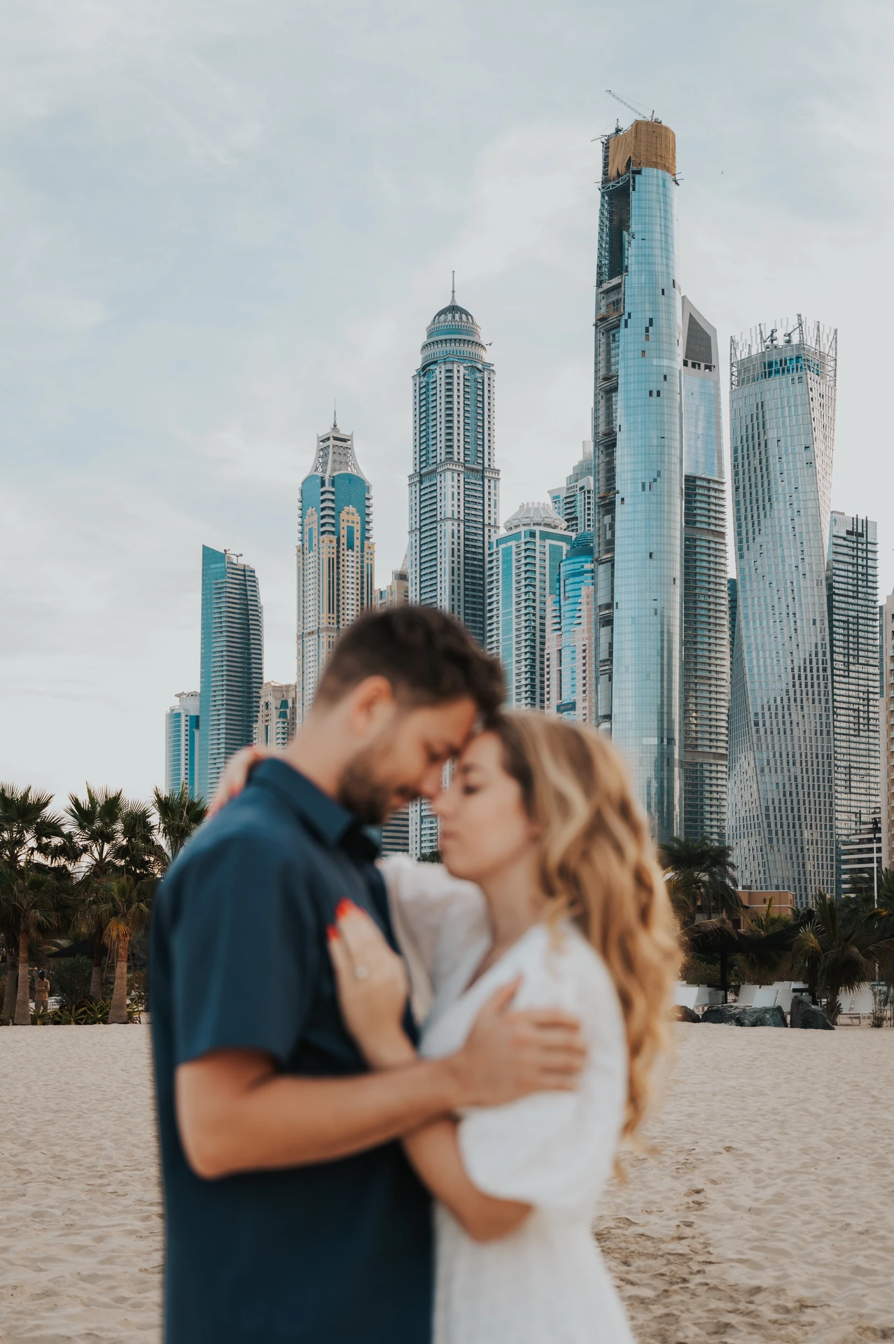 Romantic close-up at JBR with Dubai Marina skyline