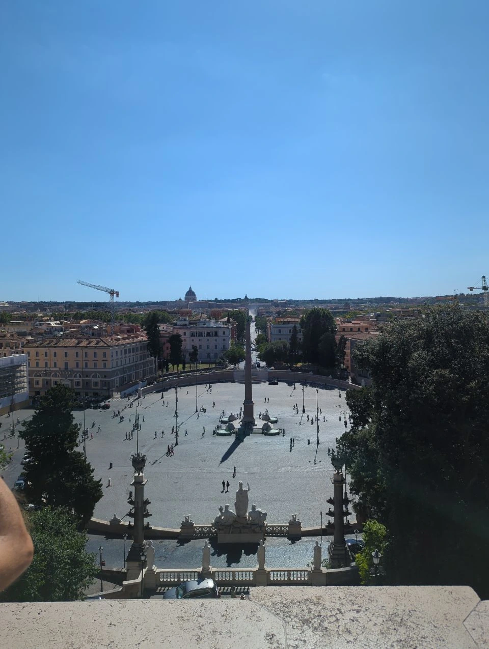 Piazza del Popolo, its central obelisk and surrounding Rome rooftops are seen from above at the Pincio terrace.