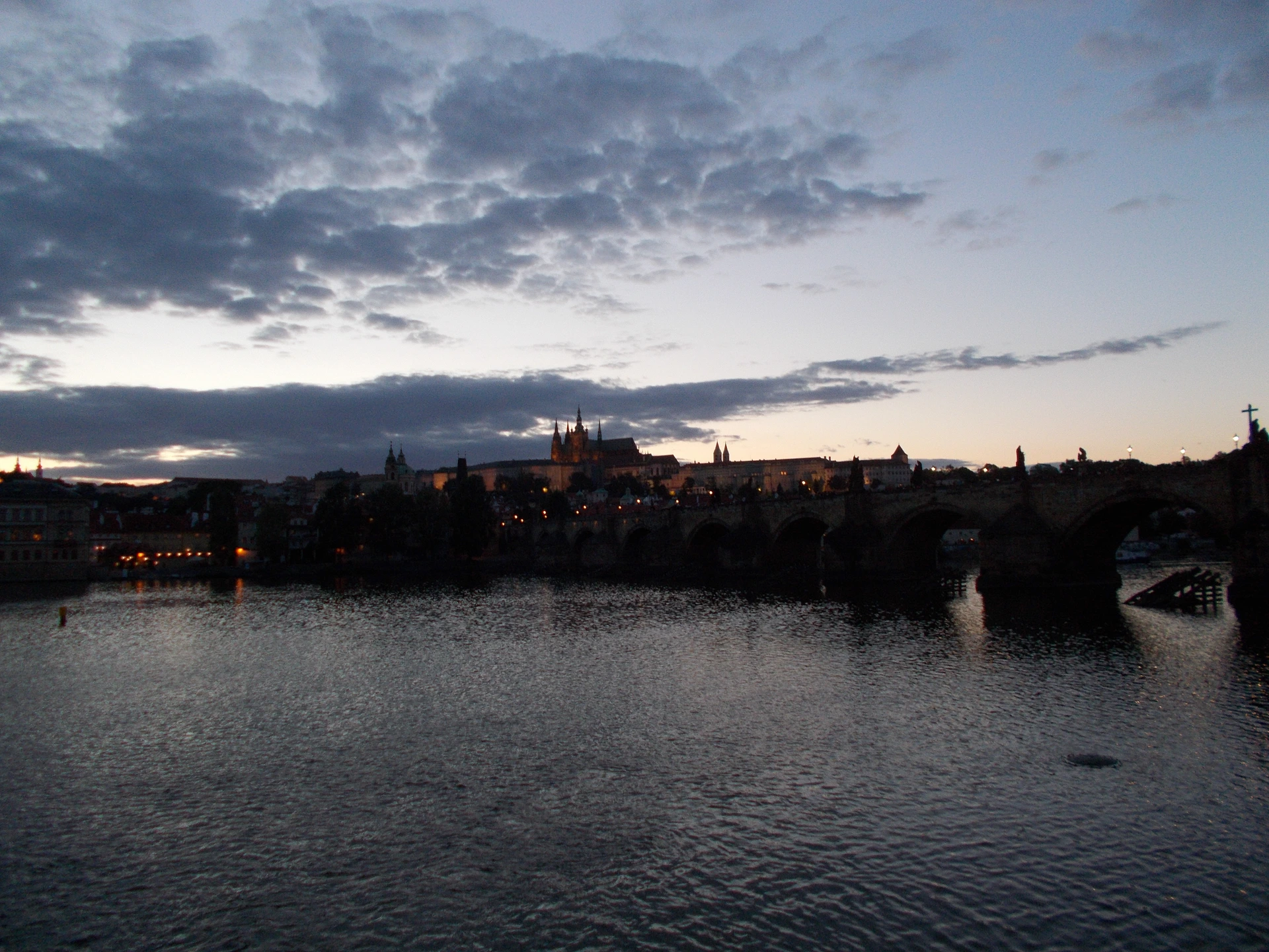 Charles Bridge riverbank view in Prague Charles Bridge and Prague riverside seen across the Vltava