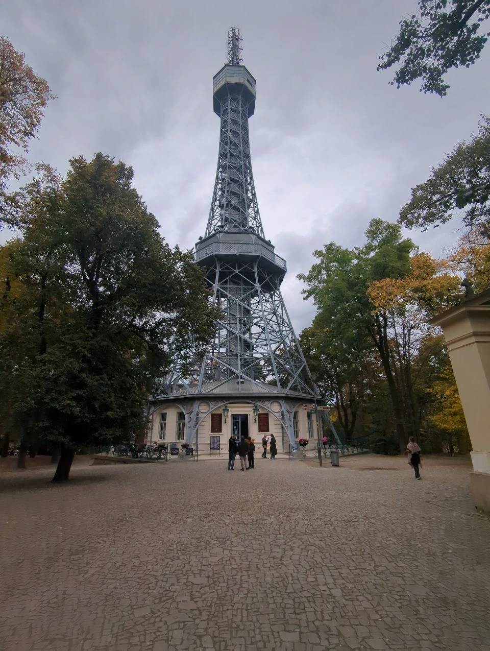 Prague Panorama Tower - Petřín Lookout The steel Petřín Lookout Tower rises above wooded paths on the hill overlooking Prague.
