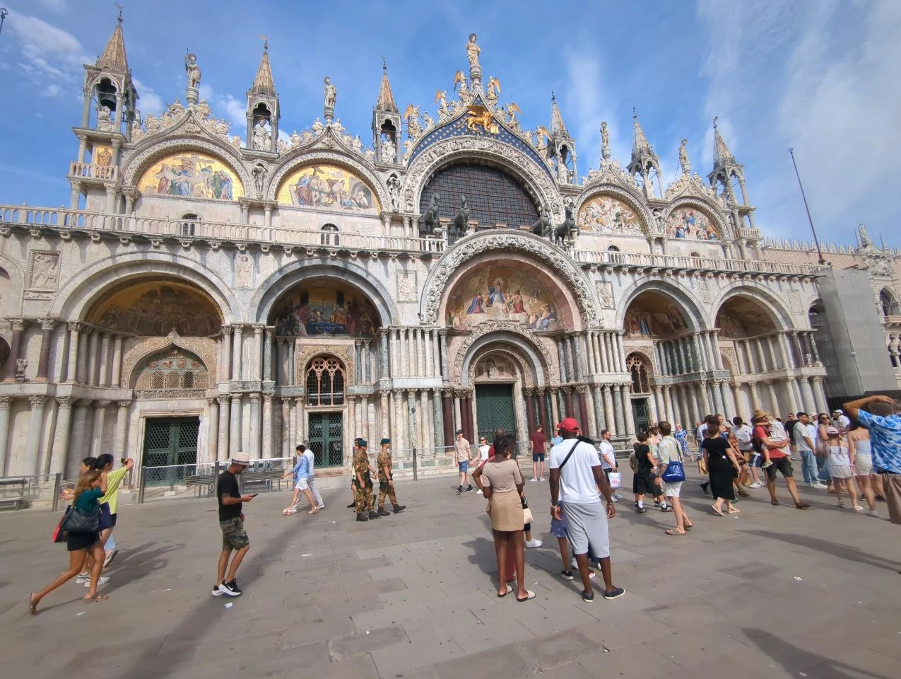 Best Places to Propose in Venice - St Mark’s Basilica St Mark’s Basilica and the lively public square in Venice, showing the scale and atmosphere of an iconic proposal backdrop.