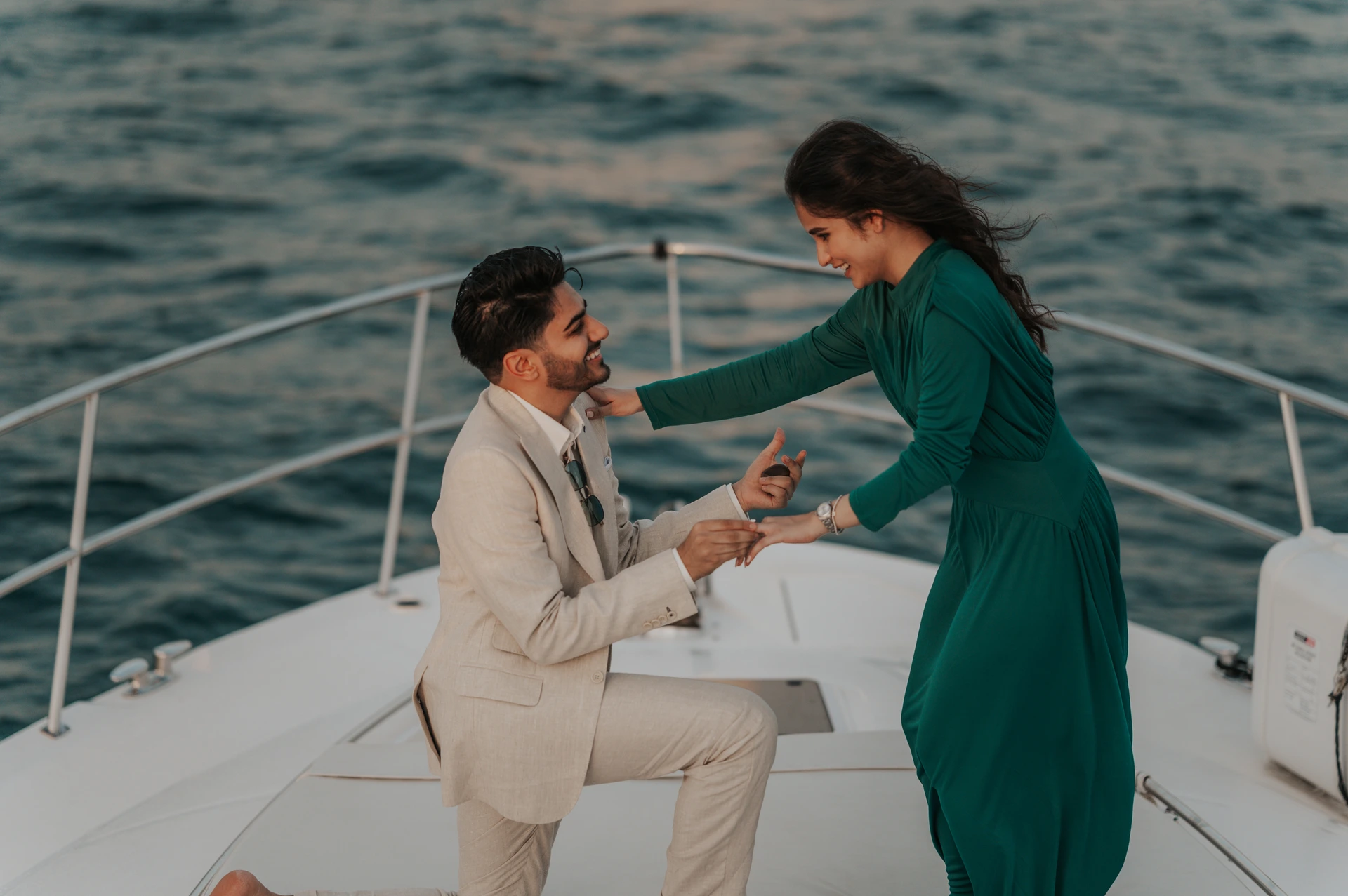 Dubai Proposal of a couple with the guy on one knee. 